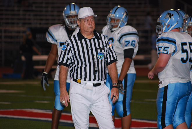 Offficial at High School football game